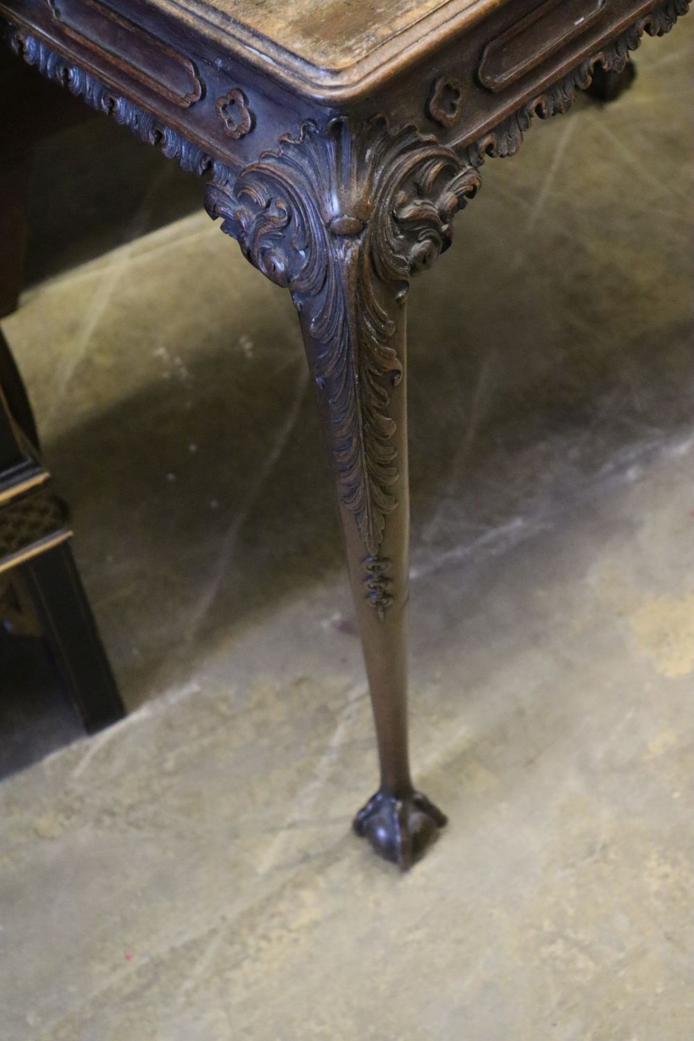 A Chippendale Revival mahogany centre table, having moulded top with rounded corners on cabriole legs and claw and ball feet, width 90c